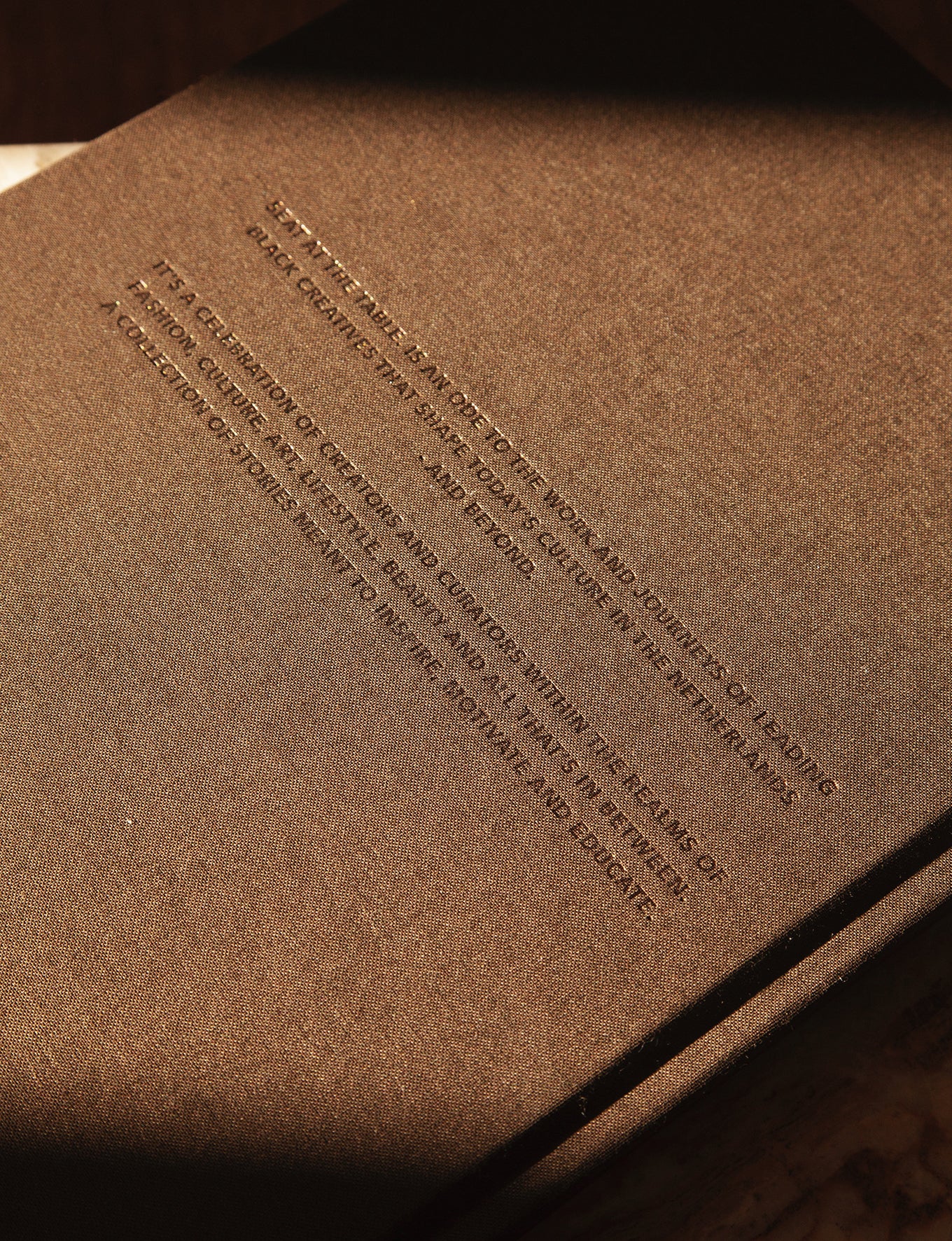 Seat at the Table. Coffee table book