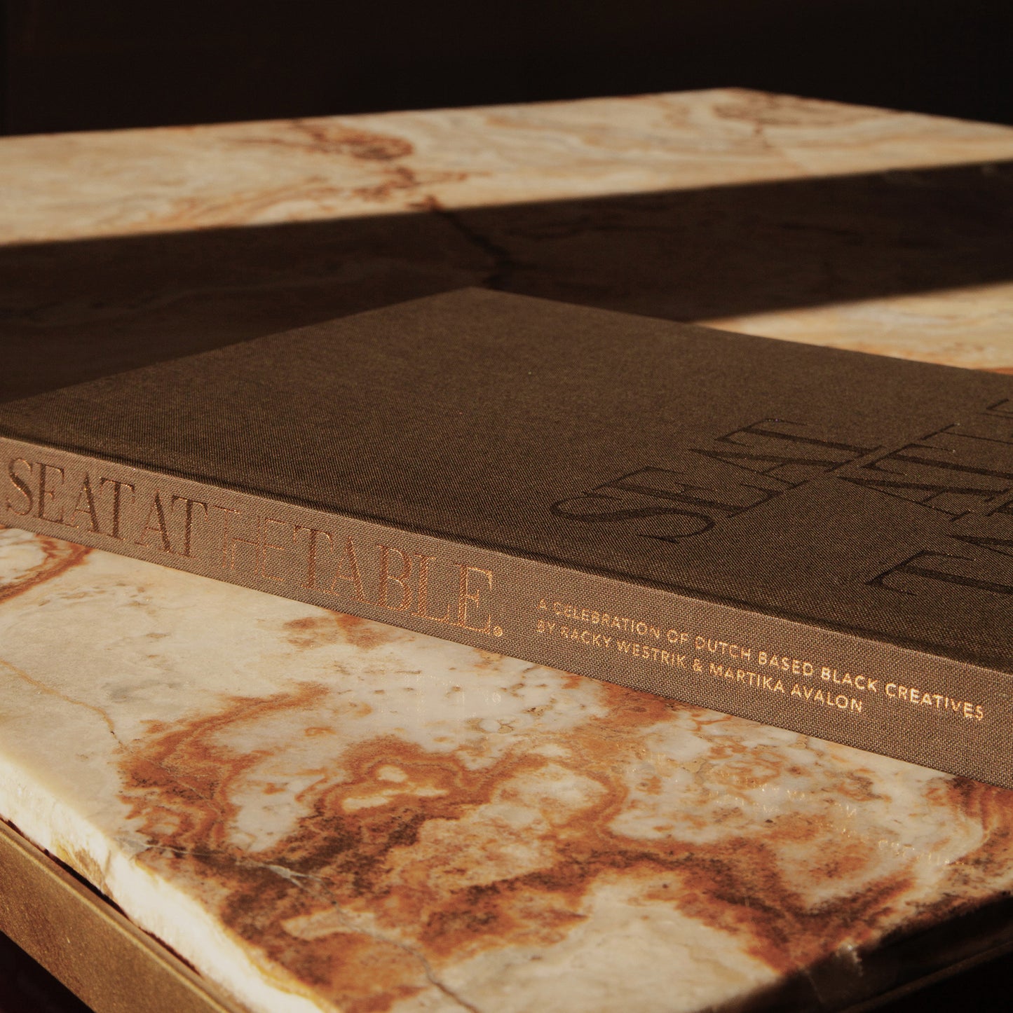 Seat at the Table. Coffee table book