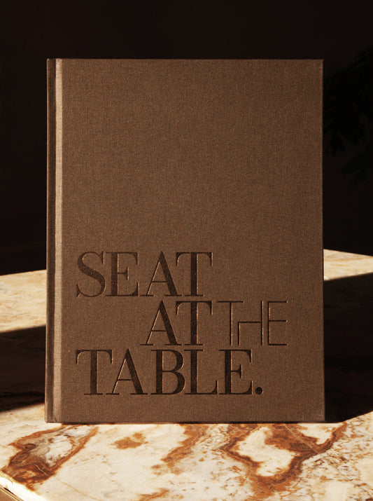 Seat at the Table. Coffee table book